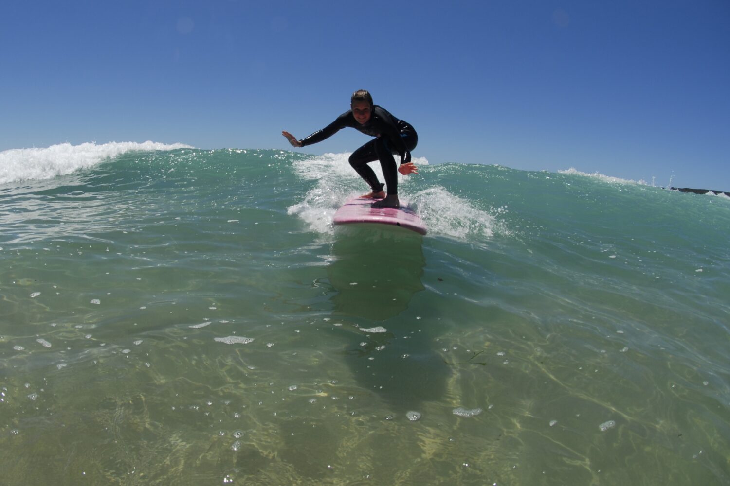 11Progressing-Beginner-Surfer-Taking-Off-On-Small-Wave-Sydney-Australia